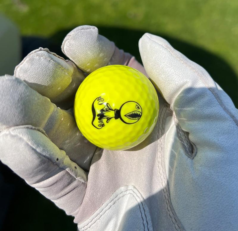 PISS MISSILE GOLF BALLS 12PK - LONG DISTANCE